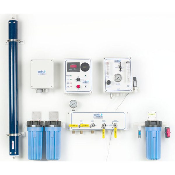 Watermakers | Advanced Reverse Osmosis Desalination Systems - Watermaker WMS-550 reverse osmosis desalination system in a modular, wall-mounted configuration. Blue and black pipes and white system boxes with dials and gauges.