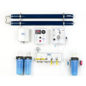 Watermakers | Advanced Reverse Osmosis Desalination Systems - Watermaker WMSQ-1000 reverse osmosis desalination system in a modular, wall-mounted configuration. Blue and blacl pipes and white system boxes with dials and gauges.