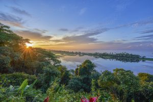 Sunrise Over a Lagoon and the Pacific in Corcovado National Park on the Osa Peninsula in Costa Rica where individuals can use a watermaker